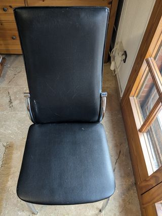 4 sillas polipiel negra y acero