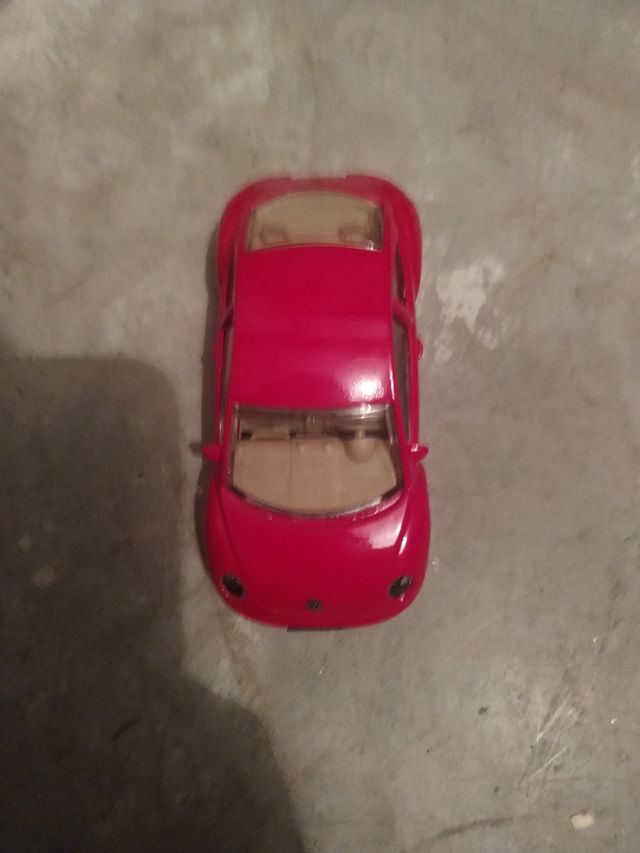 Coche VW escarabajo rojo