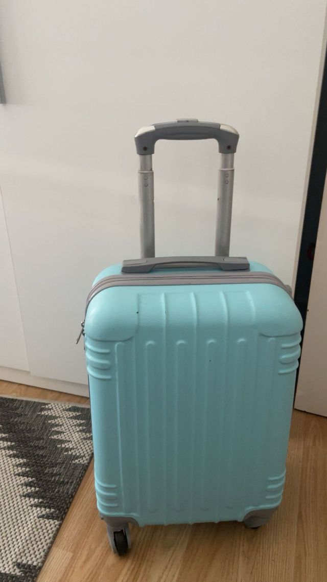 Mala de viagem turquesa