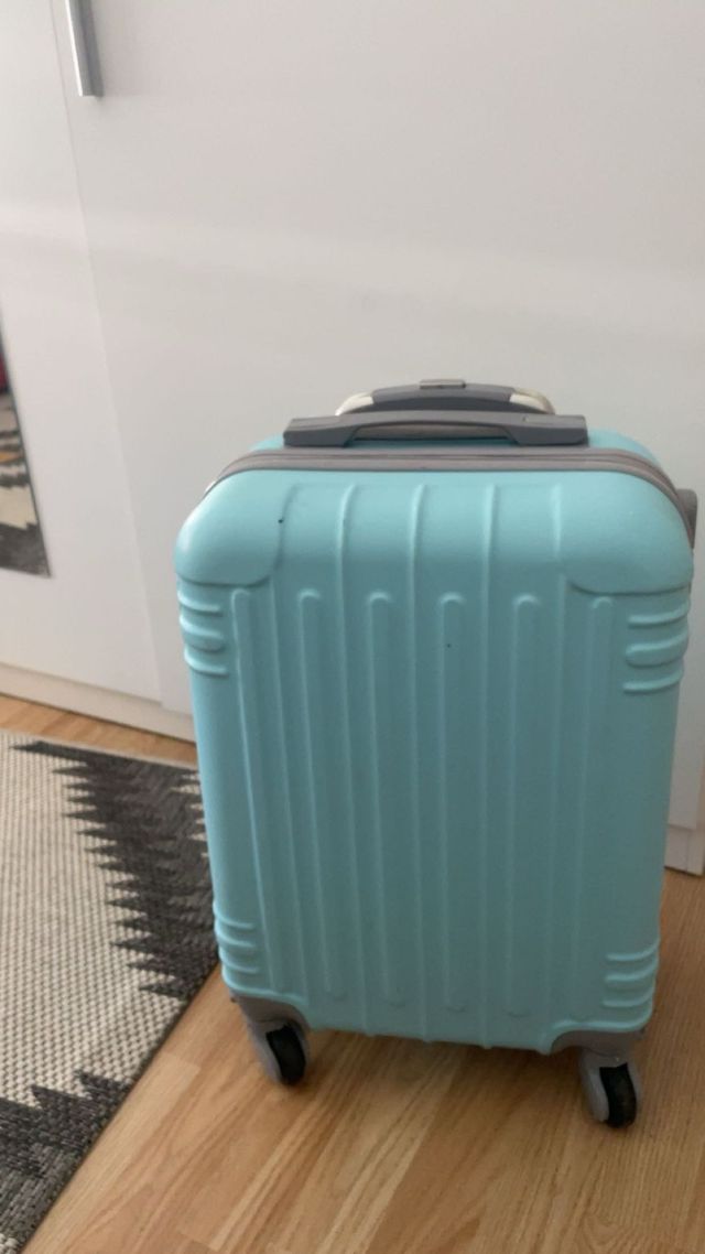 Mala de viagem turquesa