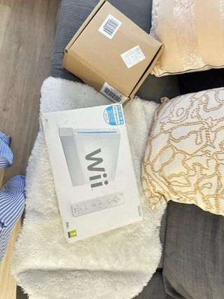 Nintendo Wii + New Super Mario Bros. Wii