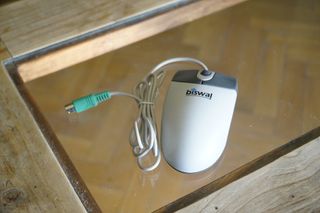 Ratón Biswal PS2 - Gris y Blanco