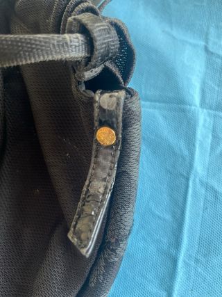 Mochila Tous negra y dorada