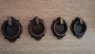 Tiradores madera y metal y porcelana