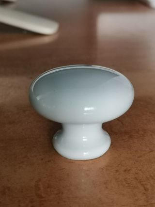 Tiradores madera y metal y porcelana