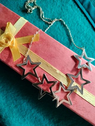 Collar estrellas acero dorado