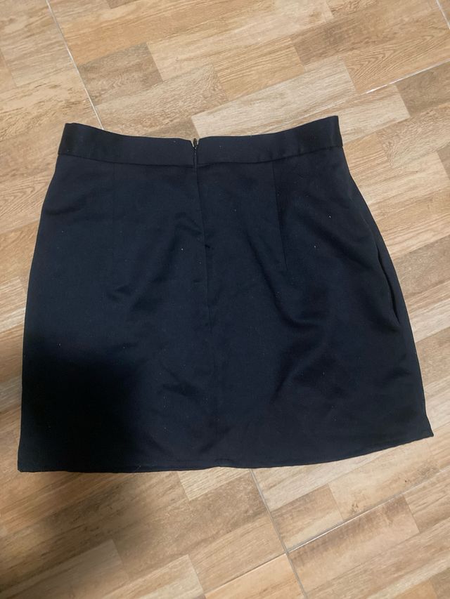 Conjunto falda y chaleco negro