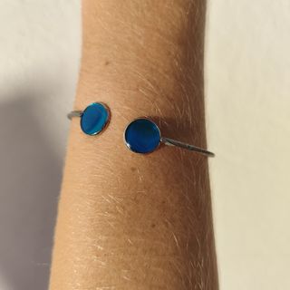 Brazaletes 2 bolas de acero inoxidable y resina.