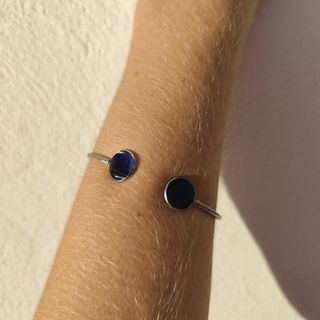 Brazaletes 2 bolas de acero inoxidable y resina.