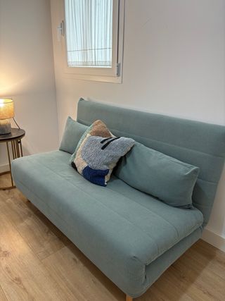 Sofá cama dos plazas verde azulado