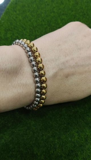 Pulseras bolas acero: oro y plata