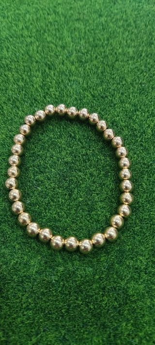 Pulseras bolas acero: oro y plata