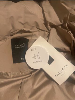 Piumino beige caldo
