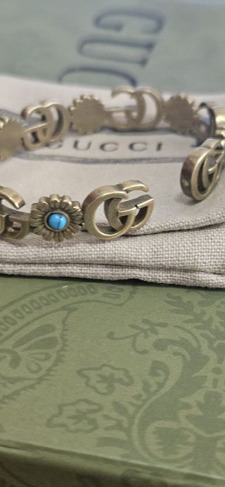 Pulsera Gucci dorada con turquesa