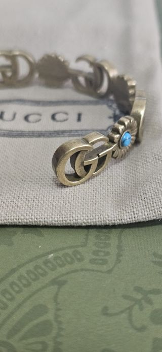 Pulsera Gucci dorada con turquesa