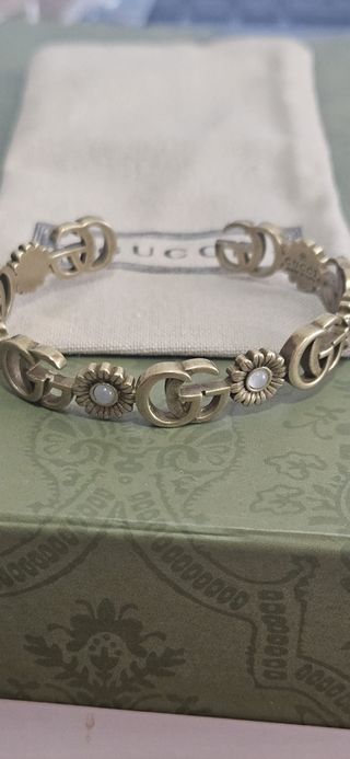 Pulsera Gucci dorada con turquesa