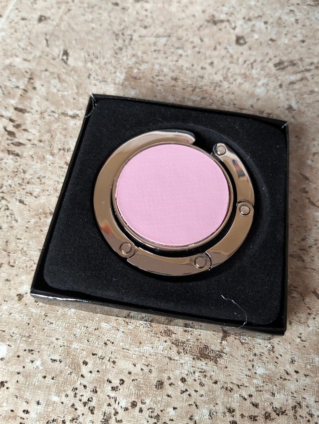 Cuelgabolsos plegable rosa