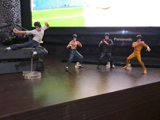 Una collezione di 4pcs di figurine di Bruce Lee