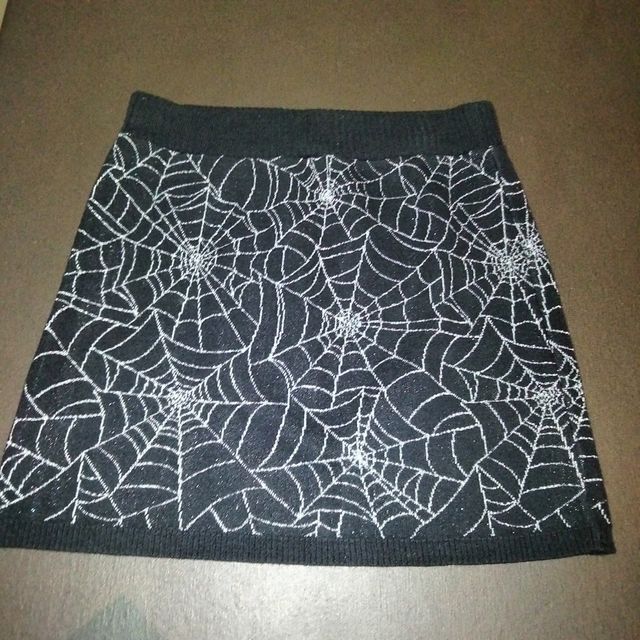 Falda niña telaraña plateada