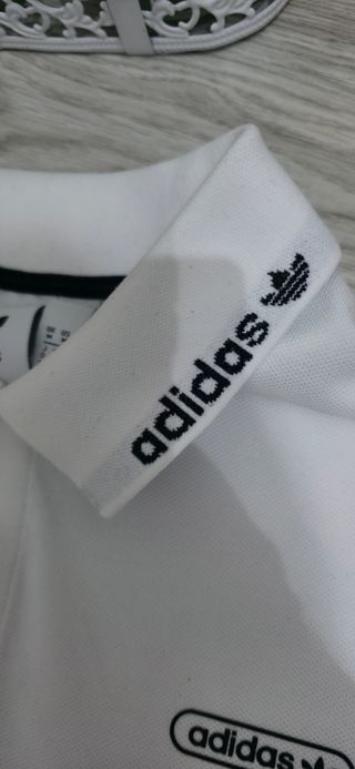 Polo Adidas blanco