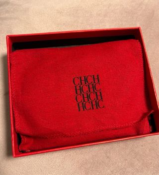 Pulsera Carolina Herrera - Negra y dorada