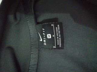 Sudadera Nike Dri-FIT negra y naranja