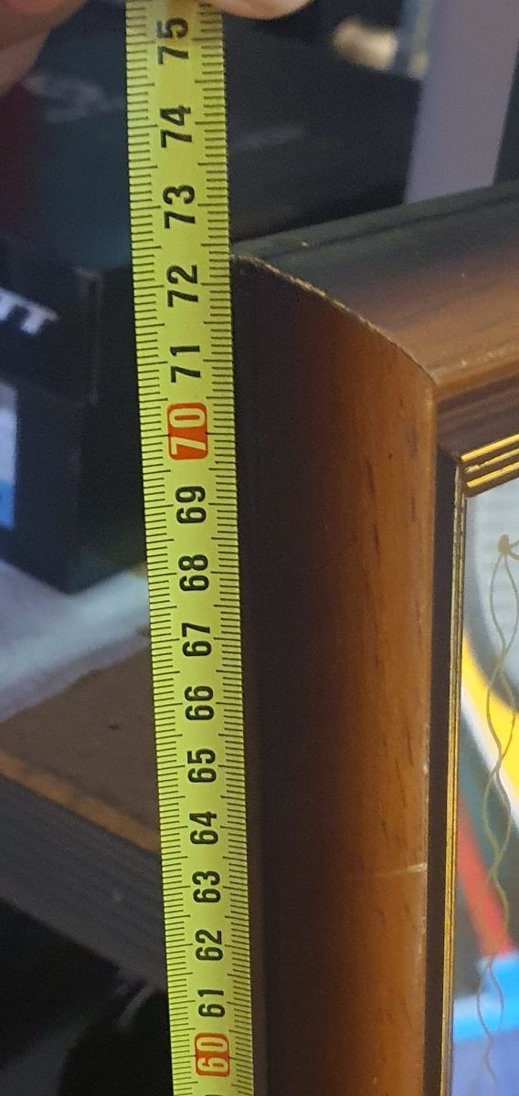 Reloj vintage de espejo con péndulo