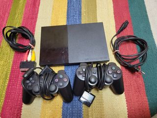 PlayStation 2 Slim + 2 joypad + 21 giochi 
