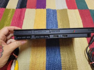 PlayStation 2 Slim + 2 joypad + 21 giochi 