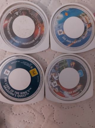 PSP Slim 2004 negra + cargador + 10 juegos