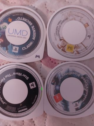 PSP Slim 2004 negra + cargador + 10 juegos