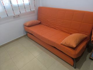 Sofá cama naranja 