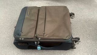Maleta viaje azul y marrón
