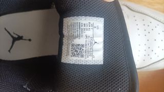 Zapatillas Nike Air Jordan 1 Mid blancas y negras