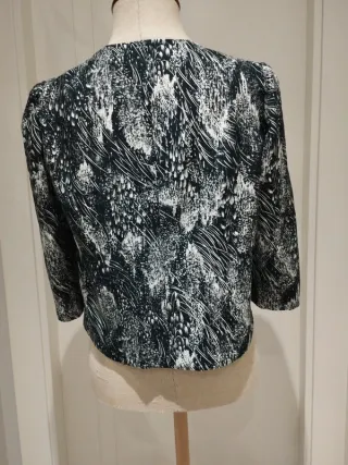 Blusa mujer v-cuello blanco-negro