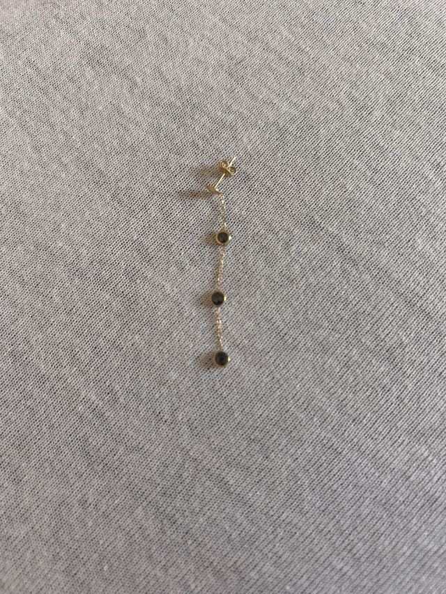 Bracciale e orecchini in oro nero