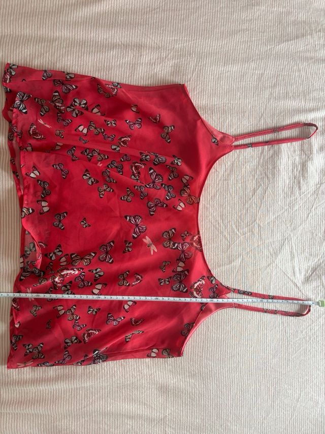 Top rosa estampado mariposas