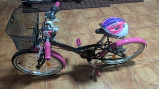 Bicicleta niña 20" negra/rosa. Se regala el casco.
