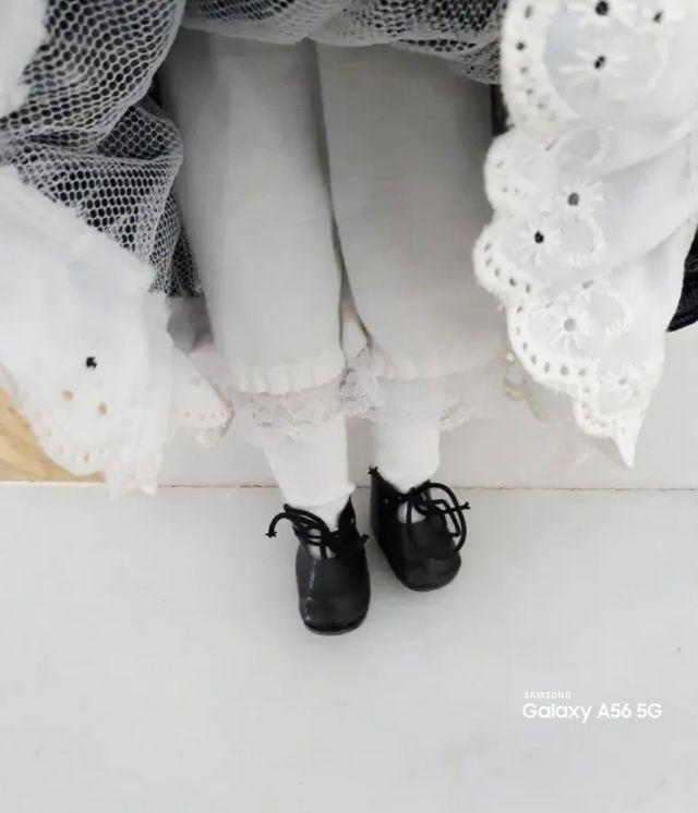 Muñeca porcelana - Vestido escocés