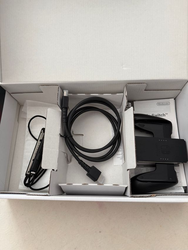 Nintendo Switch - Console Blu e Rossa con giochi