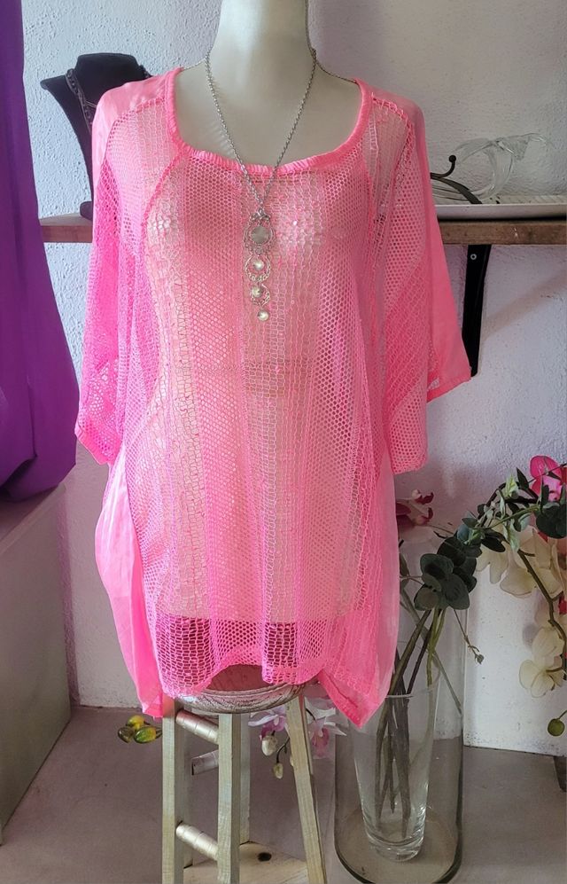 Túnica rosa transparente