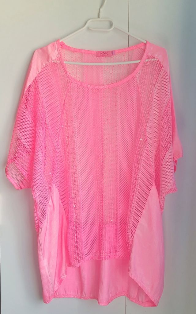 Túnica rosa transparente