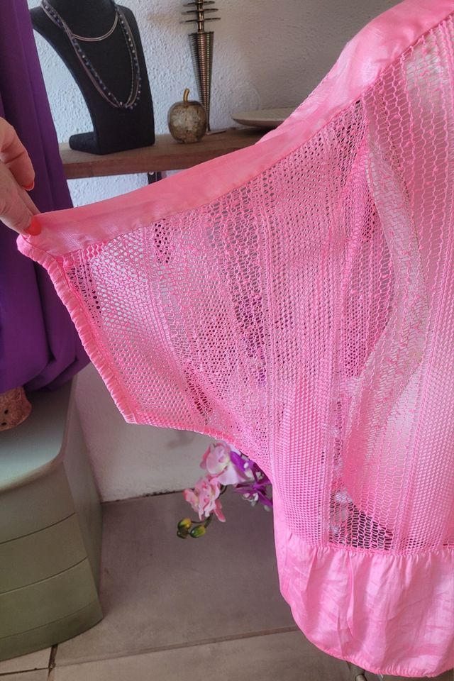 Túnica rosa transparente