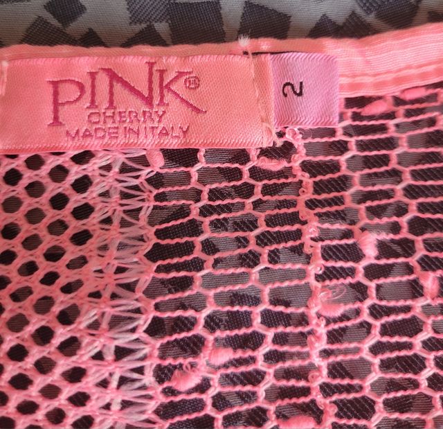 Túnica rosa transparente