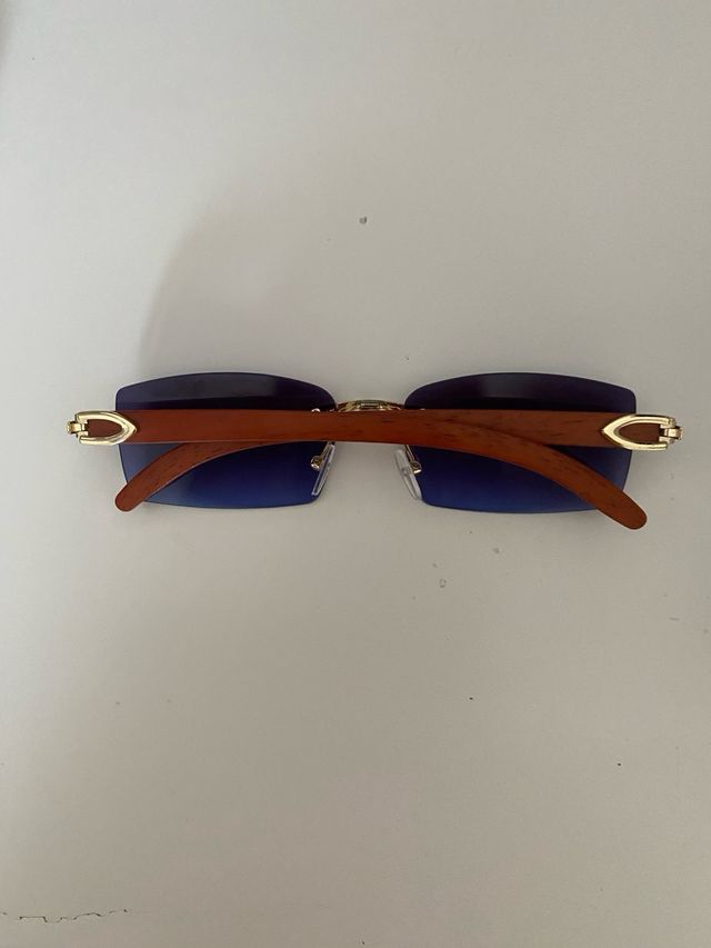 Gafas de sol azules doradas