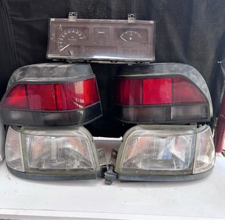 Faros y pilotos Renault Clio '95