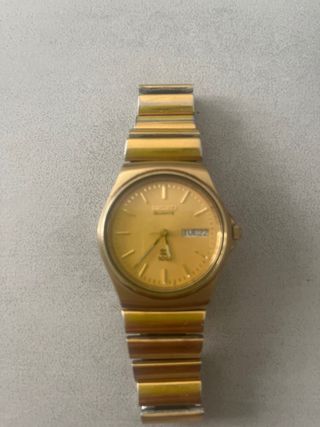 Reloj Seiko dorado vintage