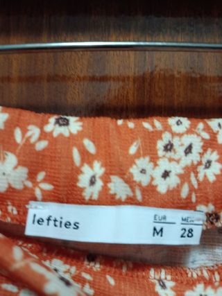 Falda midi naranja flores