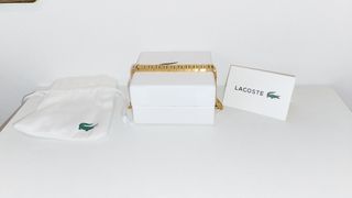 Pulsera Lacoste dorada - nueva