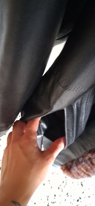 Cappotto lungo in vera pelle nero con pelliccia